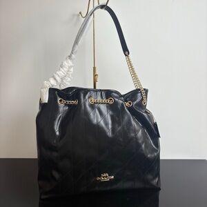 Coach Black Quilted Shoulder Bag with Gold Accents
